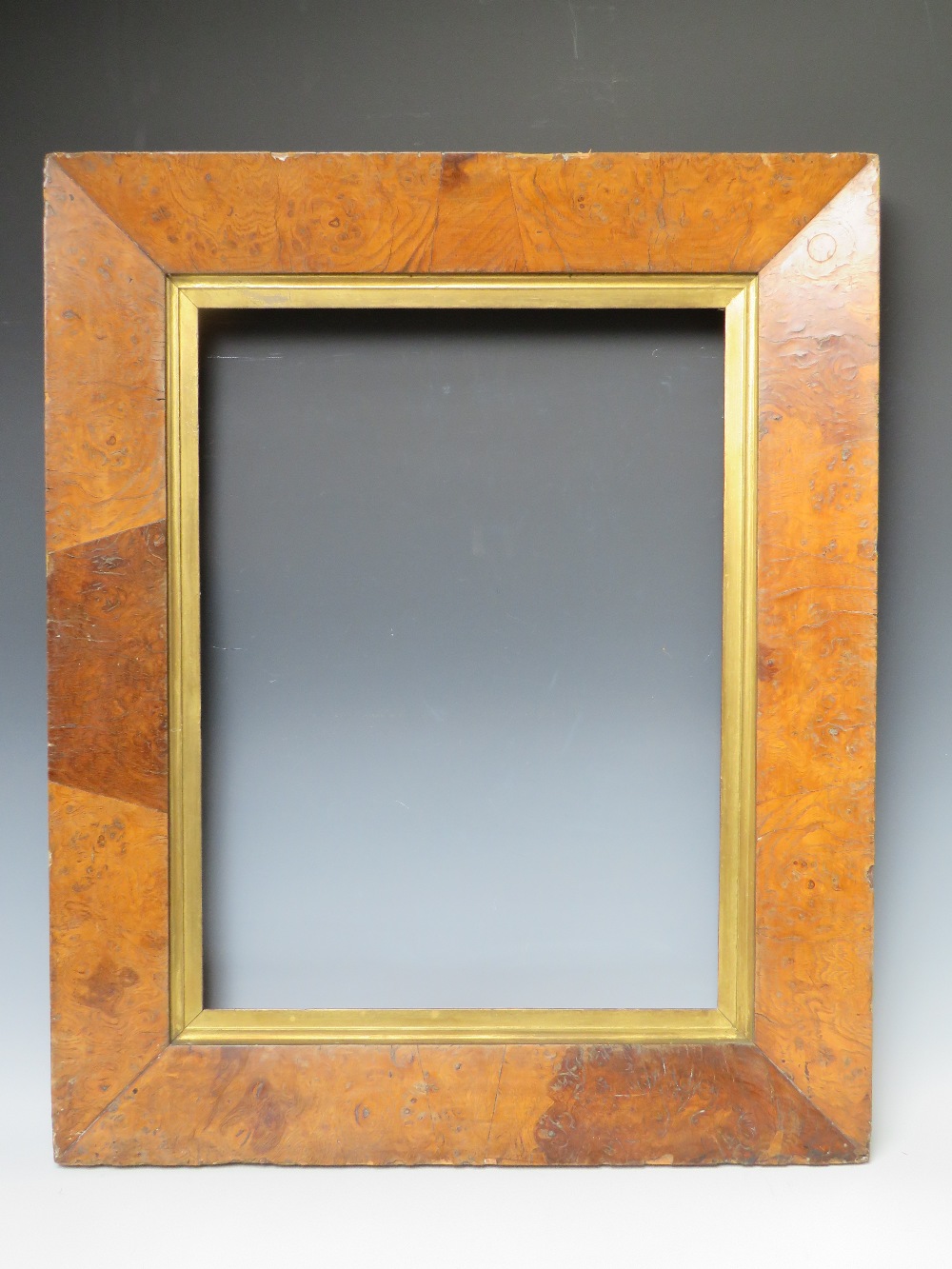 A LATE 18TH / EARLY 19TH CENTURY MAPLE FRAME, with gold slip, frame W 8 cm, rebate 57 x 44.5 cm