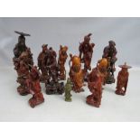 A COLLECTION OF TWELVE ASSORTED CARVED HARDWOOD ORIENTAL FIGURES, tallest H 26.5 cm, examples