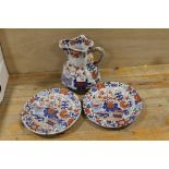 AN ANTIQUE MASONS IRONSTONE JUG TOGETHER WITH TWO PLATES