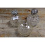 THREE ASSORTED SILVER TOPPED SCENT BOTTLES ALL A/F