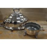 A SILVER PLATED TWIN HANDLED SERVING TRAY WITH COVER ENGRAVED WITH HERALDIC CREST TOGETHER WITH A