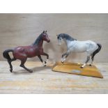 A BESWICK SPIRIT OF FIRE FIGURE TOGETHER WITH ANOTHER (2)