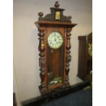 AN ANTIQUE VIENNA WALLCLOCK WITH TWO WEIGHTS AND PENDULUM H-117 CM