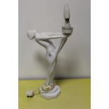 A CERAMIC FIGURATIVE NUDE TABLE LAMP