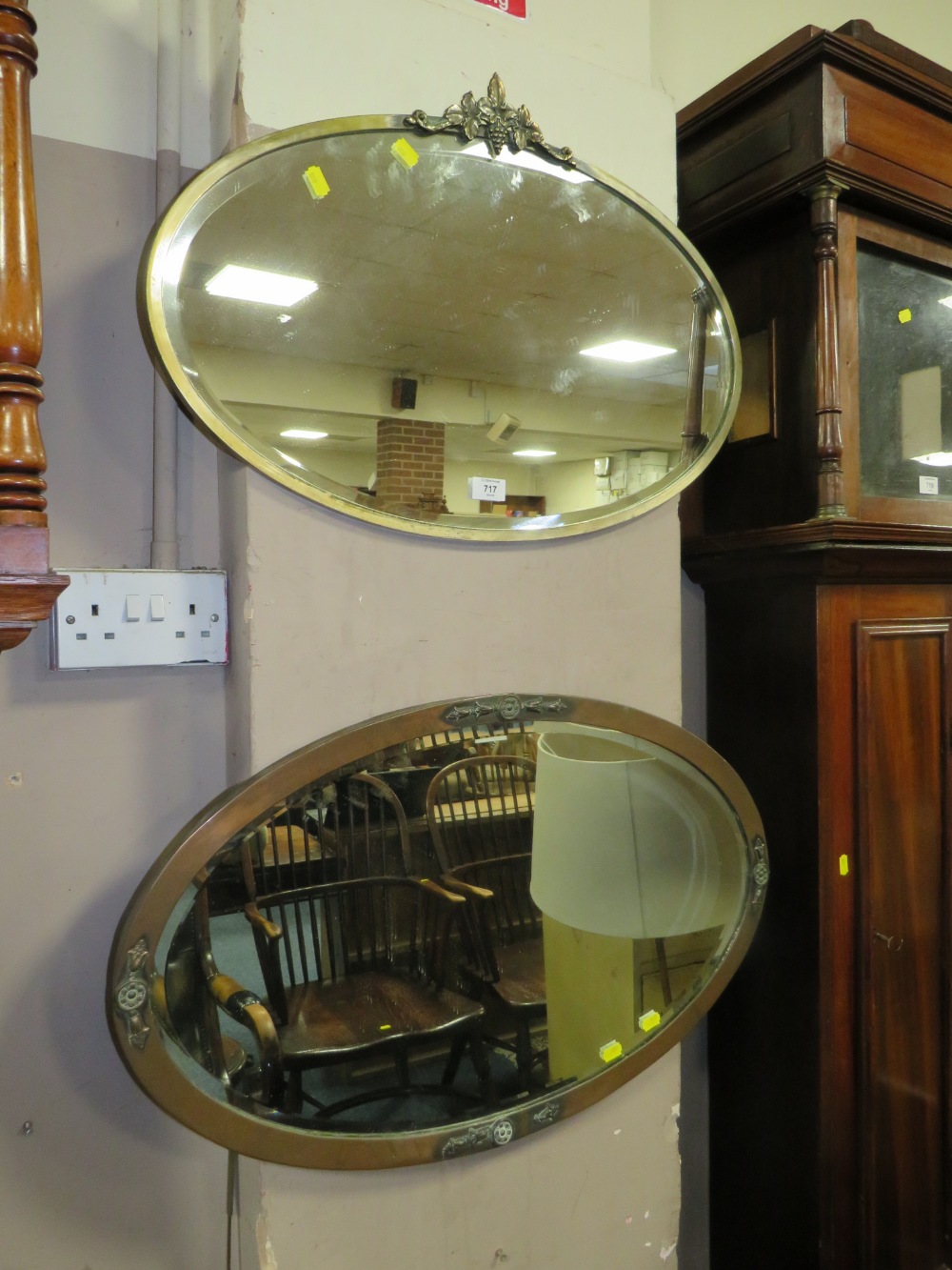 TWO ART DECO OVAL HANGING WALL MIRRORS