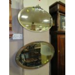 TWO ART DECO OVAL HANGING WALL MIRRORS