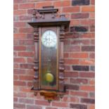 A GUSTAV BECKER CHIME STRIKE VIENNA WALL CLOCK, the case with mahogany fronted veneers, turned