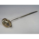 A GEORGIAN HALLMARKED SILVER LADLE WITH EBONISED HANDLE