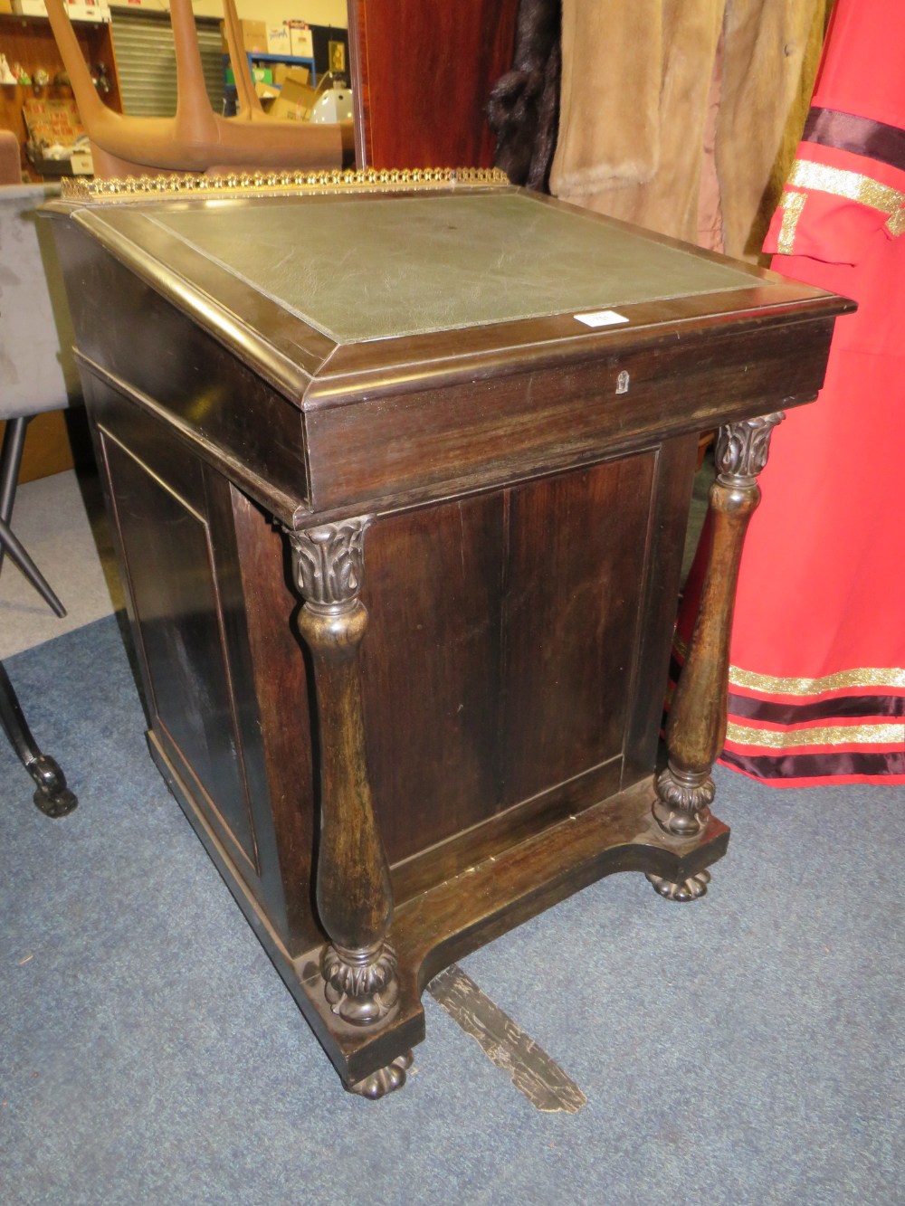 A 19TH CENTURY COLONIAL EBONY DAVENPORT DESK IN THE MANNER OF GILLOWS, the slope with brass