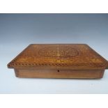 AN INLAID MUSICAL WOODEN GAMES / JEWELLERY BOX A/F, the hinged lid with profuse decoration, when lid