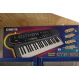 A BOXED CASIO CTK-80 KEYBOARD CONTENTS NOT CHECKED - HOUSE CLEARANCE
