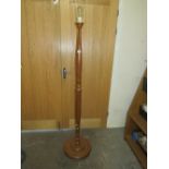 AN ORIENTAL STYLE CARVED HARDWOOD LAMP STANDARD