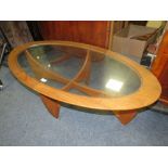 A RETRO G-PLAN TEAK ROCKET COFFEE TABLE