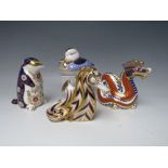 A COLLECTION OF FOUR ROYAL CROWN DERBY PAPERWEIGHTS, comprising a duck with gold stoper and a