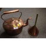 A VINTAGE COPPER KETTLE TOGETHER WITH A SIMILAR LARGE FUNNEL