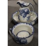 A BLUE AND WHITE JUG AND BOWL SET ETC