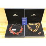 TWO BOXED SWAROVSKI GEMSET NECKLACES