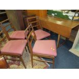 A RETRO TEAK DROPLEAF TABLE AND FOUR CHAIRS