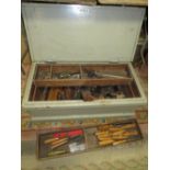 A PINE CARPENTERS TOOL BOX WITH CONTENTS INCLUDING CHISELS, PLANES ETC
