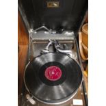 A VINTAGE PORTABLE HMV GRAMOPHONE WITH VARIOUS 78" RECORDS