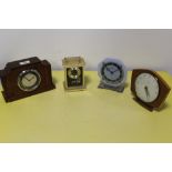 FOUR SMALL CLOCKS TO INCLUDE ART DECO EXAMPLES AND A FERRANTI EXAMPLE A/F