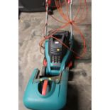 A BOSCH ELECTRIC MOWER WITH BOX - HOUSE CLEARANCE