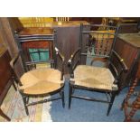 TWO EDWARDIAN EBONISED WICKER SEAT CHAIRS