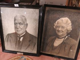 A PAIR OF FRAMED AND GLAZED CHARCOAL STYLE PORTRAITS SIGNED LOWER RIGHT - ONE WITH A SILVER TYPE