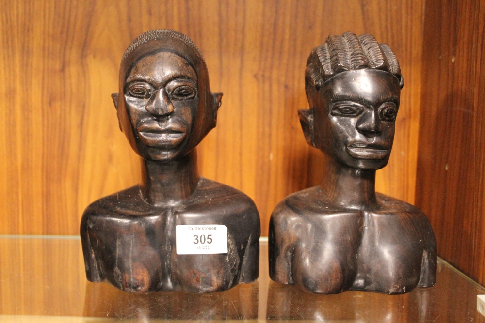 TWO AFRICAN TRIBAL HARDWOOD CARVINGS OF A MALE AND FEMALE FIGURE