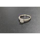 A HALLMARKED 18CT GOLD DIAMOND CLUSTER RING WITH DIAMOND SET SHOULDERS, STAMPED DIA 0.50 APPROX