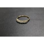 A HALLMARKED 9CT GOLD SEVEN STONE DRESS RING - APPROX WEIGHT 1.3 G