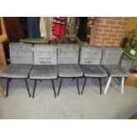 A SET OF FIVE MODERN UPHOLSTERED DINING CHAIRS