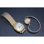 A LADIES 9 CARAT GOLD ROTARY WRIST WATCH, on expandable steel bracelet, together with a vintage Rone