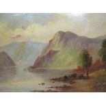 A PAIR OF GILT FRAMED OIL ON BOARD PAINTINGS OF MOUNTAINOUS LAKE SCENES SIGNED T WOOD