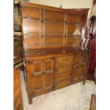 A DARK OAK ERCOL STYLE DRESSER