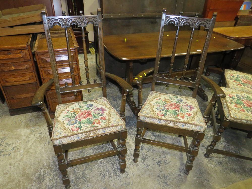 A DARK OAK ERCOL STYLE REFECTORY TABLE AND FOUR CHAIRS - Image 3 of 6