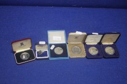 A COLLECTION OF CASED COINS AND MEDALS