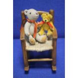 TWO ""MERRYTHOUGHT"" BEARS TOGETHER WITH A SMALL ROCKING CHAIR