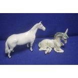 A BESWICK LUSITANO HORSE TOGETHER WITH A BASIL MATTHEWS HORSE