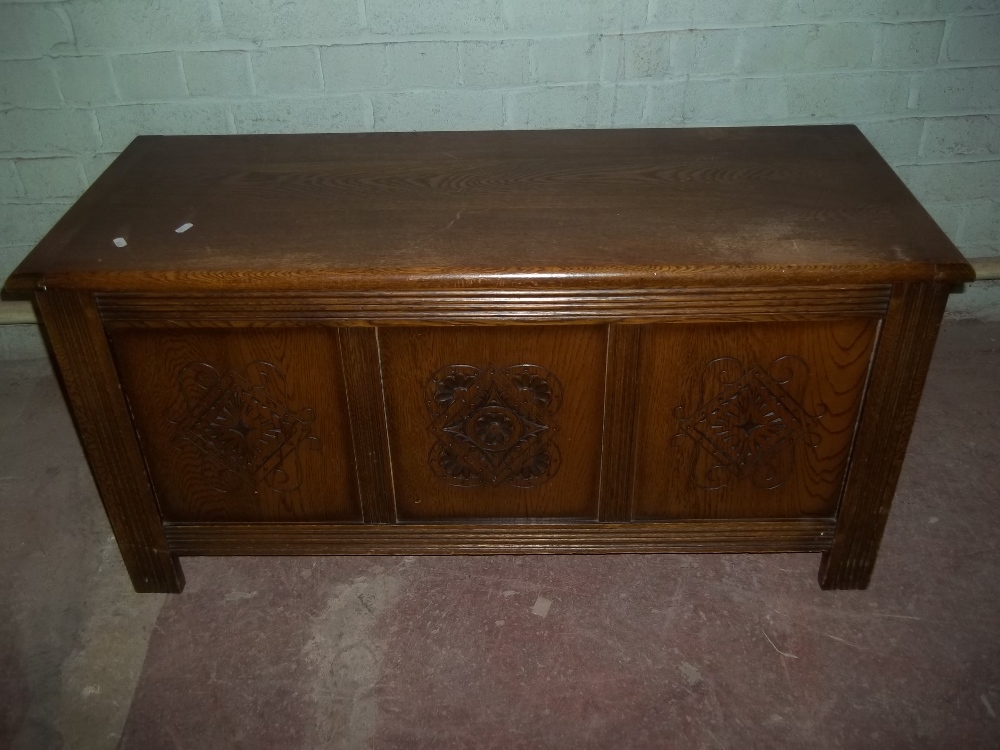 AN OAK BLANKET CHEST