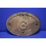 A GREAT NORTHERN RAILWAY OVAL CAST IRON SIGN