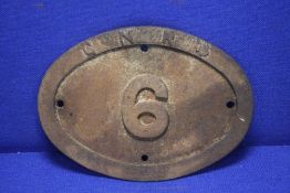 A GREAT NORTHERN RAILWAY OVAL CAST IRON SIGN