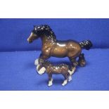 A BESWICK SHIRE HORSE TOGETHER WITH A BESWICK PONY