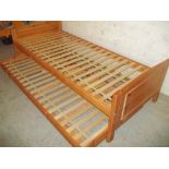 A ST MICHAEL""S PINE STORE AWAY SINGLE BED FRAME