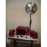 A BEKO MICROWAVE WITH A MATCHING KETTLE AND A TOASTER TOGETHER WITH A FLOOR STANDING FAN