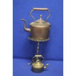 A COPPER KETTLE, A BRASS STAND AND A BRASS MINIATURE KETTLE