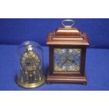 A KUNDO DOME CLOCK TOGETHER WITH A MANTLE CLOCK