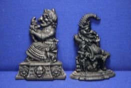 A PAIR OF PUNCH AND JUDY DOOR STOPS