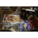 A COLLECTION OF BUFFY BOOKS AND COMICS (TRAY NOT INCLUDED)