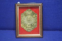 A FRAMED MILITARY PLAQUE